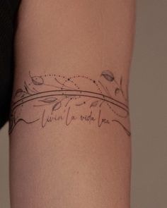 a woman with a tattoo on her arm that says, when a video lies down