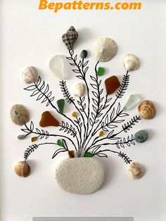 sea shells and plants are arranged in a vase on a white background with the words bead patterns com above it