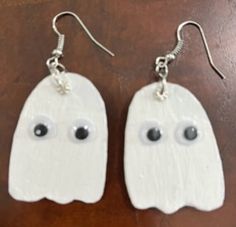 The most adorable Ghosts you'll ever see, these Ghostly Drop Earrings are HANDMADE of lightweight balsa wood covered in shimmering white enamel. Just in time for Halloween!  Limited quantity, don't miss out, order yours today! Fun White Halloween Jewelry, Fun White Jewelry For Halloween, Fun White Hypoallergenic Earrings, Novelty White Earrings For Pierced Ears, Novelty White Dangle Earrings, Novelty White Dangle Jewelry, White Novelty Dangle Jewelry, Halloween Themed White Earrings, Fun White Halloween Earrings