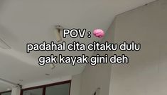 there is a pink ball hanging from the ceiling in an office building that says pov padah citta citatu duu gak