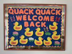 a welcome sign with rubber ducks on it