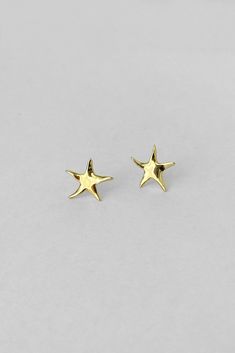 A small star that's the perfect size for your first or second piercings. Hypoallergenic 14k Gold Star Jewelry, Gold Piercings With Star Charm As Gift, Everyday 14k Gold Star Earrings, Elegant Gold Star Piercings, 14k Gold Starfish-shaped Jewelry, 14k Yellow Gold Starfish Jewelry, Everyday 14k Gold Star Jewelry, Minimalist Hypoallergenic Star Piercings, Tiny Star-shaped Piercings For Gift