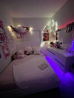 a bedroom with hello kitty decorations on the wall