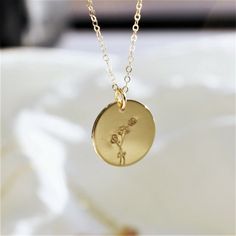 "Birth Month Flower Charm Necklace This quaint charm necklace features your choice of a birth month flower. Wear your own, your special person, your child or a BFF's. Choose silver, rose or gold necklace options, this necklace is perfect for everyday and makes a unique gift! D E T A I L S -Disc measures 16mm -Choose 14kt Gold-Filled, Sterling Silver, or Rose Gold-Filled - not plated. -A high quality delicate link chain with a spring clasp. -Polished to a light satin finish. -Great versatile desi Promise Necklace, Birth Flower Necklace, Flower Charm Necklace, Birth Month Flower, Month Flowers, Birth Month Flowers, Gold Necklaces, Birth Month, Birth Flowers