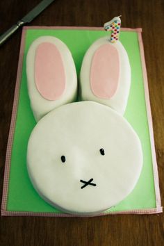 a cake shaped like a bunny on top of a table