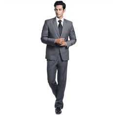 "The business suit in the image is a light Grey suit with a slim fit. It has a two-button closure, a center vent, and notched lapels. The jacket is unlined for a more casual look. The trousers are flat-front with a slim fit and a slightly tapered leg. The suit is made of a lightweight cotton-polyester blend fabric that is breathable and comfortable to wear. This suit is perfect for a day at the office, especially in warmer weather. It is also a good choice for a more casual event, such as a wedding or a garden party. To complete the look, pair the suit with a white or light blue dress shirt, a solid or patterned tie, and brown or black dress shoes. Two-button single-breasted Notch lapel Double vent Jetted pockets Structured with shoulder pads Trousers: Flat-fronted Slight taper at the ankl Slim Fit Professional Suiting Fabric Sets, Professional Sets With Notch Lapel For Business Meetings, Fitted Sets With Suit Collar For Business Meetings, Fitted Notch Lapel Sets For Business Meetings, Elegant Sets With Suit Collar For Business Meetings, Semi-formal Professional Suiting Fabric Sets, Professional Semi-formal Suiting Fabric Sets, Professional Semi-formal Sets In Suiting Fabric, Slim Fit Professional Three-piece Suit For Formal Occasions