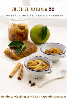 three bowls filled with food sitting on top of a table next to apples and cinnamon sticks