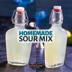 two bottles of homemade sour mix sitting on a table