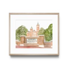 a watercolor painting of the entrance to auburn university, with trees in the background