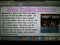 the word problem warm - up screen is displayed in front of a computer monitor with an ad on it