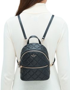 7.9''h x 6.5''w x 3.5''dquilted smooth leathertwo way spade jacquard liningmetal pinmount logointerior slip pocketexterior zip pocketstyle # wkru7075Color: Black Kate Spade Purse Pink, Kate Spade Backpack, Kate Spade Purse Black, Mini Convertible, Kate Spade Outlet, Backpack Handbag, Purple Backpack, Flap Backpack, Black Leather Backpack