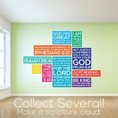 a room with a wall that has many different words on it, including the word god