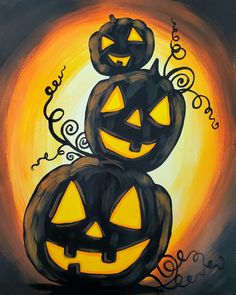 two jack o lantern pumpkins sitting on top of each other in front of an orange and black background