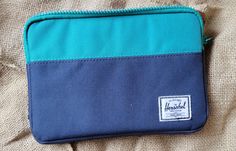 9" x 6" navy and green Herschel storage hygiene pouch bag. NWOT, great condition Blue Rectangular Zipper Travel Pouch, Portable Blue Travel Pouch, Blue Bags With Zipper Pouch For Storage, Blue Zipper Pouch Travel Accessories, Blue Zipper Pouch For Storage, Green Zipper Travel Pouch, Blue Functional Storage Pouch, Blue Travel Pouch With Cell Phone Pocket, Travel Cases