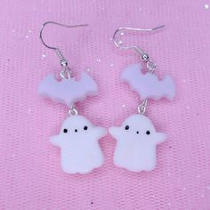 Make your Halloween Outfit super kawaii with this lovely Ghost pair of earrings They are supers sweet with a light glitter effect ♥ The earrings are composed by a lovely lilac bat and a cute ghost with a bow tie! The ghosts are handmade in polymer clay and the bow tie is handmade in resin Cute White Halloween Earrings, White Kawaii Earrings For Party, White Kawaii Jewelry For Party, Kawaii White Party Jewelry, Cute Hypoallergenic Halloween Earrings, Kawaii Ghost, Bat Earrings, Super Kawaii, Halloween Outfit