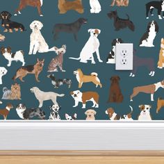 a group of dogs on a blue wallpaper with a light switch plate in the middle