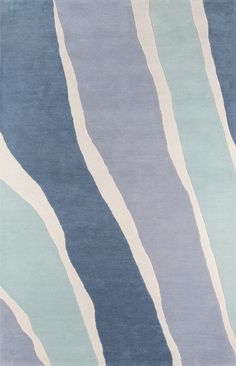 a rug with blue and white stripes on it