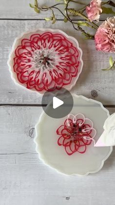 the video shows how to make paper flowers