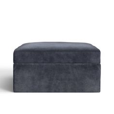 the footstool is made out of grey fabric