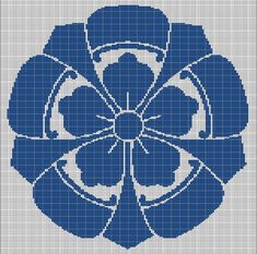 a blue flower with four petals in the center on a cross stitch pattern for a wall hanging