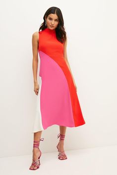 {@@=Ist.Core.Helpers.StringHelper.ToProperCase("The color-block trend continues to reign supreme for spring. Encapsulating the look, this rippling midi dress blends bold swathes of color with a high-low hemline and sleek, sleeveless silhouette. Sweep into your next spring soiree wearing it, adding architectural earrings for a modern finish.Expertly designed for those 5'3" and under, our Petite pieces are perfectly proportioned for a smaller frame using shorter lengths.")} Modern A-line Maxi Dress For Spring, Fitted Spring Dress With Contrast Color, Spring Fitted Dress With Contrast Color, Chic Spring Dresses With Contrast Color, Chic Color Block Maxi Dress, Trendy Color Block Dresses For Spring, Trendy Color Block Spring Dresses, Fitted Color Block Maxi Dress For Spring, Pink Asymmetrical Hem Midi Dress For Spring