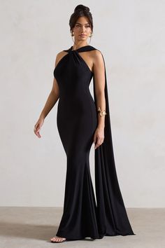 a woman in a black evening gown