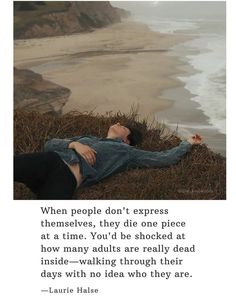 a man laying on the ground next to an ocean with a quote about people don't express themselves