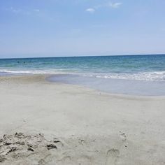 the beach is clean and ready to be used for swimming or playing in the water