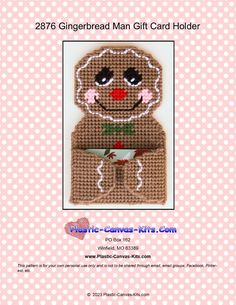 the gingerbread man gift card holder is made out of crochet and has a red nose