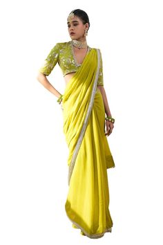 Lime green saree with lace detailing on the hem. Paired with a floral sequin embroidered, padded blouse featuring lace and pearl detailing around the neckline. - Aza Fashions Designer Green Pre-draped Saree With Embroidered Border, Festive Green Pre-draped Saree With Embroidered Border, Wedding Georgette Blouse With Embroidered Border, Green Blouse With Sheer Dupatta For Wedding, Green Wedding Blouse With Sheer Dupatta, Bollywood Style Blouse With Embroidered Border For Receptions, Traditional Blouse With Embroidered Border For Receptions, Festival Blouse With Embroidered Border For Reception, Festival Embroidered Border Blouse For Reception