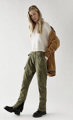 Free People Rule Breaker Slim Pants  New With Tags Size 6 Retails $168 Color:  Army GreenMaterial : 100% Cotton So cool with utility-inspired edge, these pants are the perfect elevated staple. Fit: Low-rise, harem-inspired slim silhouette Features: Workwear detailing throughout, hardware zip hemlines, zip fly and button closure, oversized patch pockets Why We <3 It: Perfectly paired with moto boots or a sleek bodysuit, these pants have endless ways to wear. Inseam 33.5"/Waist 32"/Rise 13"/Leg Opening 12" Zipped Line/dot on inside label to prevent return to retail stores. Women Rule, Free People Overalls, Rule Breaker, People Women, Green Cargo, Patched Jeans, Free People Jeans, Themed Outfits, Slim Pants