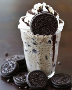 an oreo cookie milkshake with cookies around it