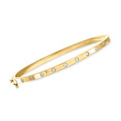 Ross-Simons - .50ct t. w. Diamond Station Bangle Bracelet in 14kt Yellow Gold. 7". Our luxe bangle bracelet would make a sparkly addition to your favorite stack, but it is certainly glamorous enough to shine on its own. The classic style is crafted in beaming 14kt yellow gold, stationed with glittering .50 ct. t. w. round brilliant-cut diamonds. Hinged with a figure 8 safety. Box clasp, diamond station bangle bracelet. Diamond birthstones are the perfect gift for April birthdays. Fine Jewelry Diamond Bracelets With Channel Set, Stackable Yellow Gold Diamond Bracelet With Cubic Zirconia, Yellow Gold Stackable Diamond Bracelet With Cubic Zirconia, Yellow Gold Cubic Zirconia Stackable Diamond Bracelet, Fine Jewelry Diamond Bracelet Channel Set, Channel Set Diamond Bracelet Fine Jewelry, Classic Yellow Gold Diamond Bracelet Channel Set, Classic Yellow Gold Diamond Bracelet With Channel Set, Classic Yellow Gold Channel Set Diamond Bracelet