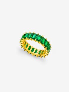 This gold eternity ring with emerald green stones is perfect for adding a pop of colour to your everyday outfits this season.  Wear it alone for a minimalistic look or stack it with our popular eternity ring for an extra sparkle: https://www.etsy.com/uk/listing/874164678/gold-eternity-ring-white-cubic-zirconia 𝗚𝗢𝗢𝗗 𝗧𝗢 𝗞𝗡𝗢𝗪 Forget the fear of tarnishing, skin irritation or green staining; you deserve better than that. We work with only the finest 18 Carat Gold and Sterling Silver which Emerald Green Jewelry, Green Stone Jewelry, Green Jewellery, Gold Eternity Ring, Emerald Green Stone, Ring With Emerald, Valentine Gift For Wife, Eternity Ring Gold, Emerald Ring Gold