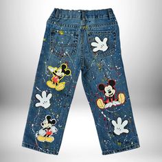 Introduce your child to a world of magic with our Mickey Mouse Pants Set! This delightful ensemble includes lightweight denim pants featuring playful paint splatter and charming Mickey images, capturing the fun and whimsy of Disney's beloved character. Paired with a soft, 100% cotton shirt personalized with your child's name, age, and a vibrant image of Mickey Mouse, this set is perfect for birthdays, special occasions, or everyday adventures. Comfortable and stylish, it's designed to make your Lightweight Denim Pants, Mickey Mouse Images, Boys Denim, Equatorial Guinea, Denim Outfit, Ethiopia, Cambodia, Brunei, Caribbean Netherlands