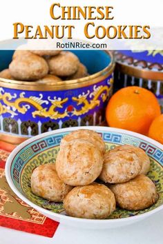 there are some oranges in the bowl next to other bowls with food on them