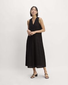 Chic Unlined V-neck Maxi Dress, Chic V-neck Unlined Maxi Dress, Unlined V-neck Sleeveless Dress, Casual Sleeveless V-neck Dress For Work, Casual V-neck Unlined Maxi Dress, Casual Maxi Length V-neck Dress For Daywear, Spring Chic Midi Dress By Everlane, Chic Sleeveless Midi Dress With Pockets, Chic Spring Midi Dress By Everlane