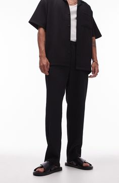 Textural rib lends depth to these edgy wide-leg trousers topped by a comfy elastic waist. 26 1/2" inseam; 14" leg opening; 13" front rise; 17 1/2" back rise (size Medium) Elastic waist Front slant pockets; back welt pockets 94% polyester, 6% elastane Machine wash, line dry Made in Turkey Ribbed Wide-leg Workwear Pants, Ribbed Wide-leg Pants For Work, Black Pants With Straight Hem For Spring, Black Straight Hem Pants For Spring, Full-length Ribbed Pants For Workwear, Black Relaxed Fit Straight Leg Dress Pants, Relaxed Fit Wide Leg Ribbed Pants, Ribbed Workwear Pants, Ribbed Wide Leg Pants With Relaxed Fit