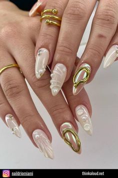 These pearly white nails with gold accents are the epitome of elegance. The 3D elements add a sophisticated touch that’s sure to turn heads. If luxury is your style, these nails are your new best friend. White 3d Nails, White And Gold French Tip Nails, White Elegant Nails, Pearly White Nails, Nails With Gold Accents, Gold French Tip, White Nails With Gold, Lily Nails, Nails With Gold