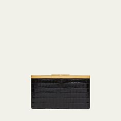 TOM FORD crossbody bag in shiny croc-embossed leather, viscose, and silk  Chain shoulder strap Detachable, adjustable crossbody strap Can be worn as a clutch, shoulder, or crossbody bag  Framed top with T-lock closure  Interior, one slip pocket  Approx. 5.9"H x 10.2"W x 1.2"D Made in Italy