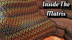 a couch with a blanket on it and the words inside the matix above it