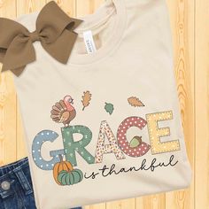 Introducing our adorable Thanksgiving Youth T-Shirt, perfect for adding a touch of fall charm to your little one's wardrobe. Made with the renowned Bella + Canvas brand, this t-shirt ensures exceptional quality and comfort for your child's Thanksgiving adventures. The design includes a friendly turkey, pumpkins, and falling leaves. Whether your child is playing in the fall leaves, attending a Thanksgiving celebration with family, or simply embracing the spirit of the season, our t-shirt will be Toddler Thanksgiving Shirt, Thanksgiving Toddler, Thanksgiving Design, Thanksgiving Kids, Thanksgiving Shirts, Kids Graphic Tees, Fall Design, Personalized Shirts, Personalized T Shirts