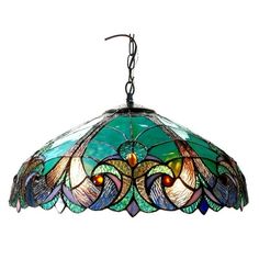 a stained glass lamp hanging from a chain