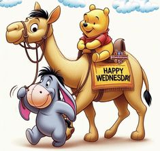 winnie the pooh riding on top of a camel