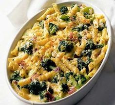 a casserole dish with broccoli and cheese