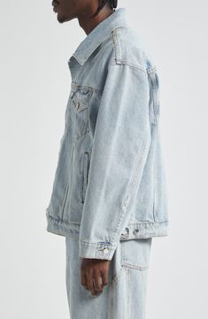 The LA-based label brings its signature California-subculture vibe to a streetwear-staple trucker jacket cut from light-wash denim in an oversized silhouette. Front button closure Spread collar Button cuffs Chest button-flap patch pockets; front welt pockets 100% cotton Machine wash, tumble dry Imported Designer Clothing Oversized Light Wash Urban Outerwear, Urban Oversized Light Wash Outerwear, Oversized Light Wash Outerwear For Streetwear, Faded Denim Jacket For Spring Streetwear, Spring Faded Denim Jacket For Streetwear, Light Wash Relaxed Fit Denim Jacket For Streetwear, Relaxed Fit Light Wash Denim Jacket For Streetwear, Oversized Urban Washed Blue Denim Jacket, Washed Blue Relaxed Fit Denim Jacket For Streetwear