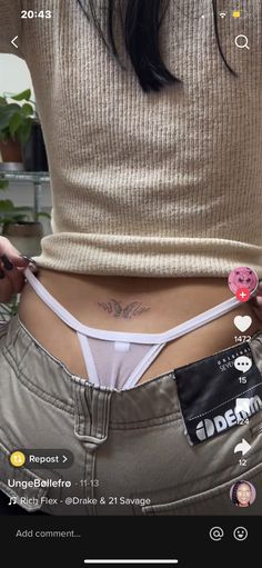 a woman with her stomach covered in stickers