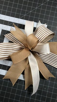 how to make an everyday bow with ribbon and duct tape on the outside of it