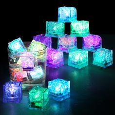 glowing ice cubes sitting on top of a table