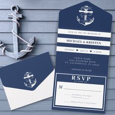 a blue and white boarding card with an anchor on the front is next to it